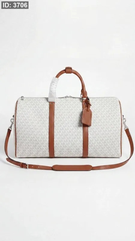 شنطة سفرية -  Micheal Kors / مقاس 50 CM شامل ايد